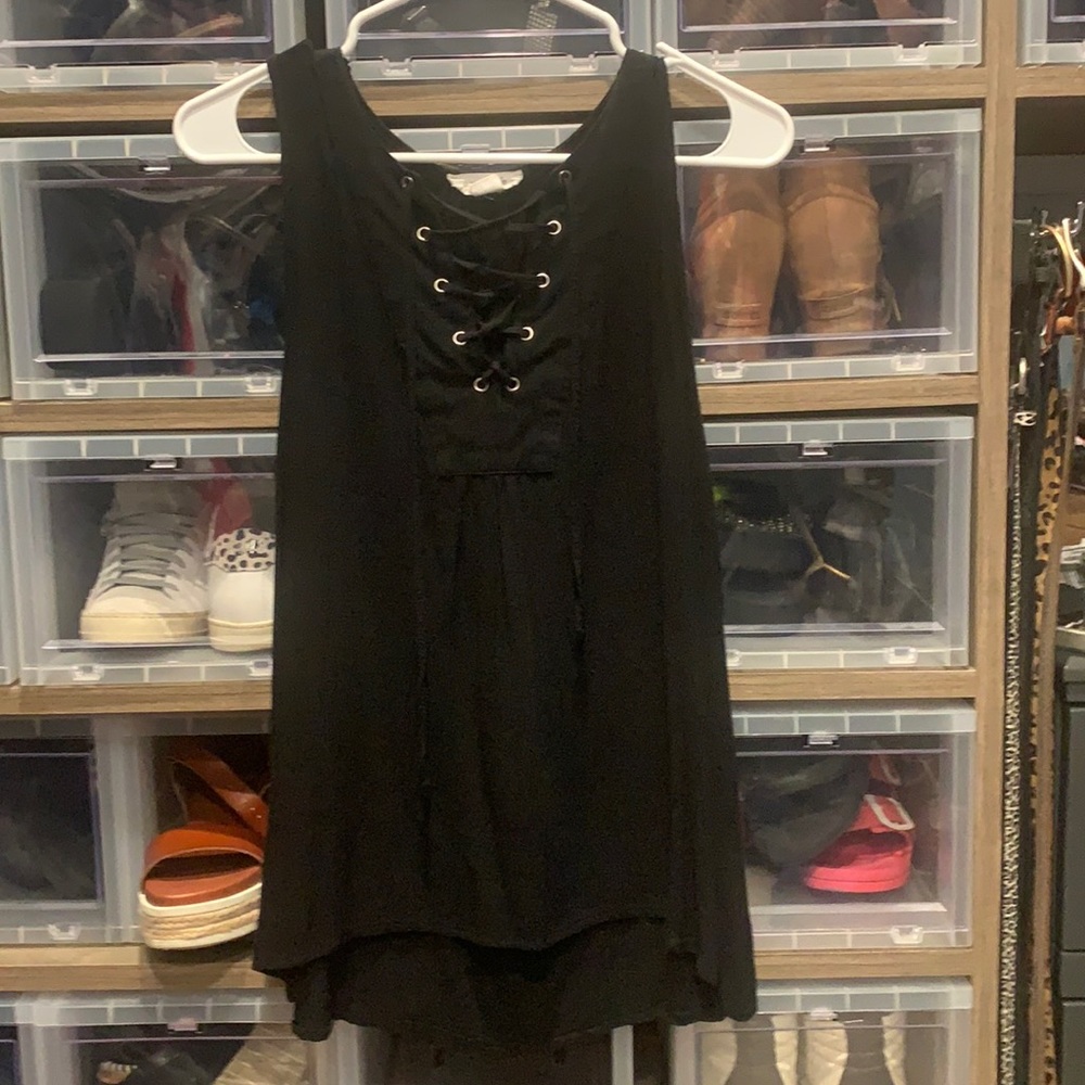I am selling a black lace up tank size large